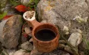 Finnische Kuksa aus Maserbirke und Rentierhorn - Motiv Wolf
